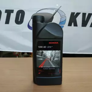 Четыре банки оригинального моторного масла HONDA фото